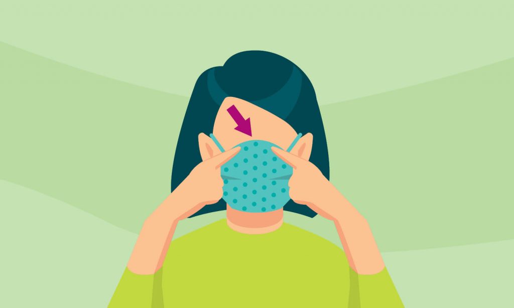 This visual shows a person properly wearing a homemade cloth mask. Two elastics are attached to both ends of the mask that can be looped over the ears to keep it in place. Make sure your mask covers your nose and mouth completely.